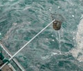 Cleaning the garbage from the sea. Royalty Free Stock Photo