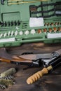 Cleaning the gun on a wooden table Royalty Free Stock Photo