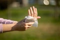 Cleaning hands and fingers with wet wipes against disease infection like flu or influenza Royalty Free Stock Photo