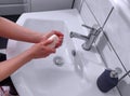 Cleaning hands. Soap in hands for cleaning. Hand hygiene