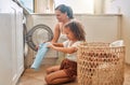 Cleaning, help and washing machine with mother and daughter for laundry, learning and cleaner. Housekeeping, teamwork Royalty Free Stock Photo