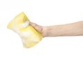 Cleaning the house and sanitation topic: Hand holding a yellow s