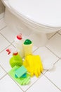 Cleaning items gloves brush white toilet bowl bathroom Royalty Free Stock Photo