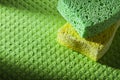 Cleaning kitchen sponges on washcloth Royalty Free Stock Photo