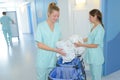 Cleaning ladies doing housekeeping in clinic