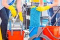 Cleaning ladies mopping floor Royalty Free Stock Photo