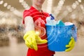 Cleaning lady clicks on a dollar hologram on a blurred background