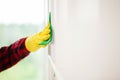 The cleaning lady does the cleaning in the office with a wet cloth Royalty Free Stock Photo