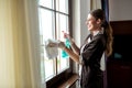 Cleaning lady managing a hotel room Royalty Free Stock Photo