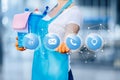 The cleaning lady shows icons contact information Royalty Free Stock Photo