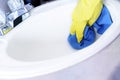 Cleaning the lavabo Royalty Free Stock Photo
