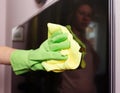 Cleaning a lcd tv Royalty Free Stock Photo