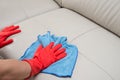 Cleaning leather sofa Royalty Free Stock Photo