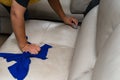 Cleaning leather sofa at home Royalty Free Stock Photo