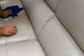 Cleaning leather sofa at home Royalty Free Stock Photo