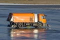 Cleaning machine wet asphalt at the international airport