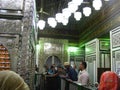 people praying inside mosque holy grave of sayda zainab in egypt cairo