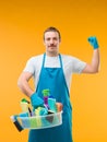 Cleaning man showing his biceps Royalty Free Stock Photo