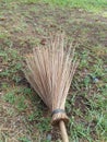 Sweeping outdoors using a broom Royalty Free Stock Photo