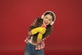 Cleaning party. Girl wear headphones and protective gloves for cleaning. Listening music and cleaning house. Having fun Royalty Free Stock Photo