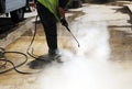 Disinfection coronavirus, Cleaning the pavement of the street with pressurized water