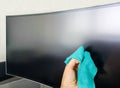 Cleaning pc monitor hand hold rag Royalty Free Stock Photo