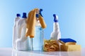 Cleaning products and equipment on white table overview Royalty Free Stock Photo