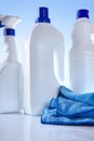 Cleaning products on white table vertical view Royalty Free Stock Photo