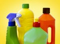 Cleaning products on yellow background