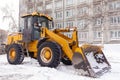 Cleaning and cleaning of roads in the city from snow in winter Royalty Free Stock Photo