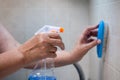 cleaning the room. tile cleaning with a blue plastic brush Royalty Free Stock Photo