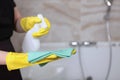 Cleaning service in an expensive hotel or at home. A woman in a uniform and rubber gloves.Cleanliness and hygiene in the