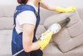 Cleaning service with professional equipment during work. professiona carpet dry cleaning, sofa dry cleaning, window and floor Royalty Free Stock Photo