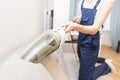 Cleaning service with professional equipment during work. professiona carpet dry cleaning, sofa dry cleaning, window and floor Royalty Free Stock Photo