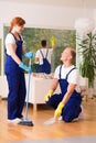 Cleaning service sweeping floor Royalty Free Stock Photo