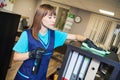 Cleaning service. wiping office furniture with cloth Royalty Free Stock Photo