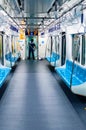 A cleaning service worker inside the passenger car of the Jakarta subway