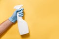 Cleaning Service Worker. Male hand with bottle of disinfectant Royalty Free Stock Photo