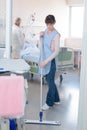 Cleaning services with washing mop in clean hospital Royalty Free Stock Photo