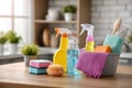 Cleaning set with products and tools on kitchen table Royalty Free Stock Photo