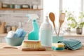 Cleaning set with products and tools on kitchen table Royalty Free Stock Photo