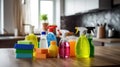 Cleaning set with products and tools on kitchen table. Cleaning services Royalty Free Stock Photo