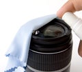 Cleaning Camera Lens with Cloth and Spray