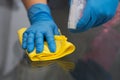 Cleaning with spray detergent, rubber gloves and dish cloth on work surface Royalty Free Stock Photo