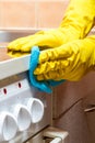 Cleaning the stove in the kitchen - hands Royalty Free Stock Photo