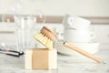 Cleaning supplies for dish washing and soap bubbles indoors Royalty Free Stock Photo