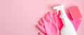 Cleaning supplies on pink background. Cleaning service banner design with spray bottle, pink gloves and sponge. Housecleaning