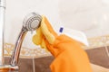 Cleaning tap from limescale bathroom sink close-up Royalty Free Stock Photo