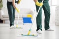 Cleaning team wiping the floor Royalty Free Stock Photo