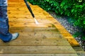 cleaning terrace with a power washer - high water pressure clean Royalty Free Stock Photo